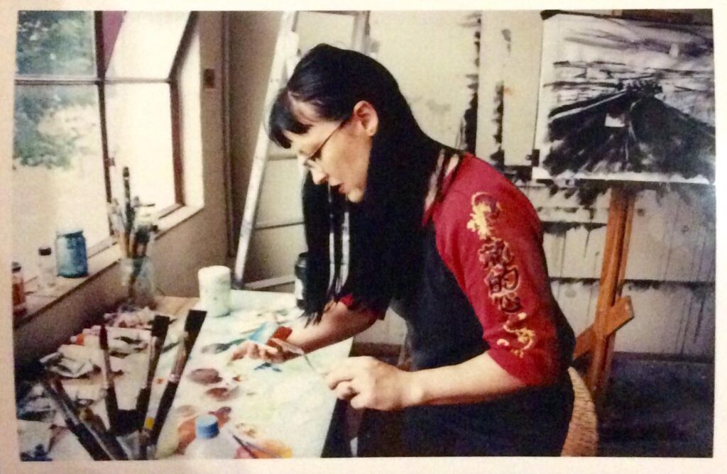 Artist in art studio Image of a young Amanda van Gils in her Carlton studio