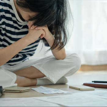 worried woman sitting on floor art isn't selling