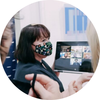 group coaching meeting at gallery exhibition